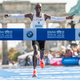 Illustration for article titled Eliud Kipchoge Breaks Marathon World Record By More Than A Minute